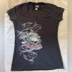 Harley Davison womans T-shirt. One small hole pointed out in the last slide.